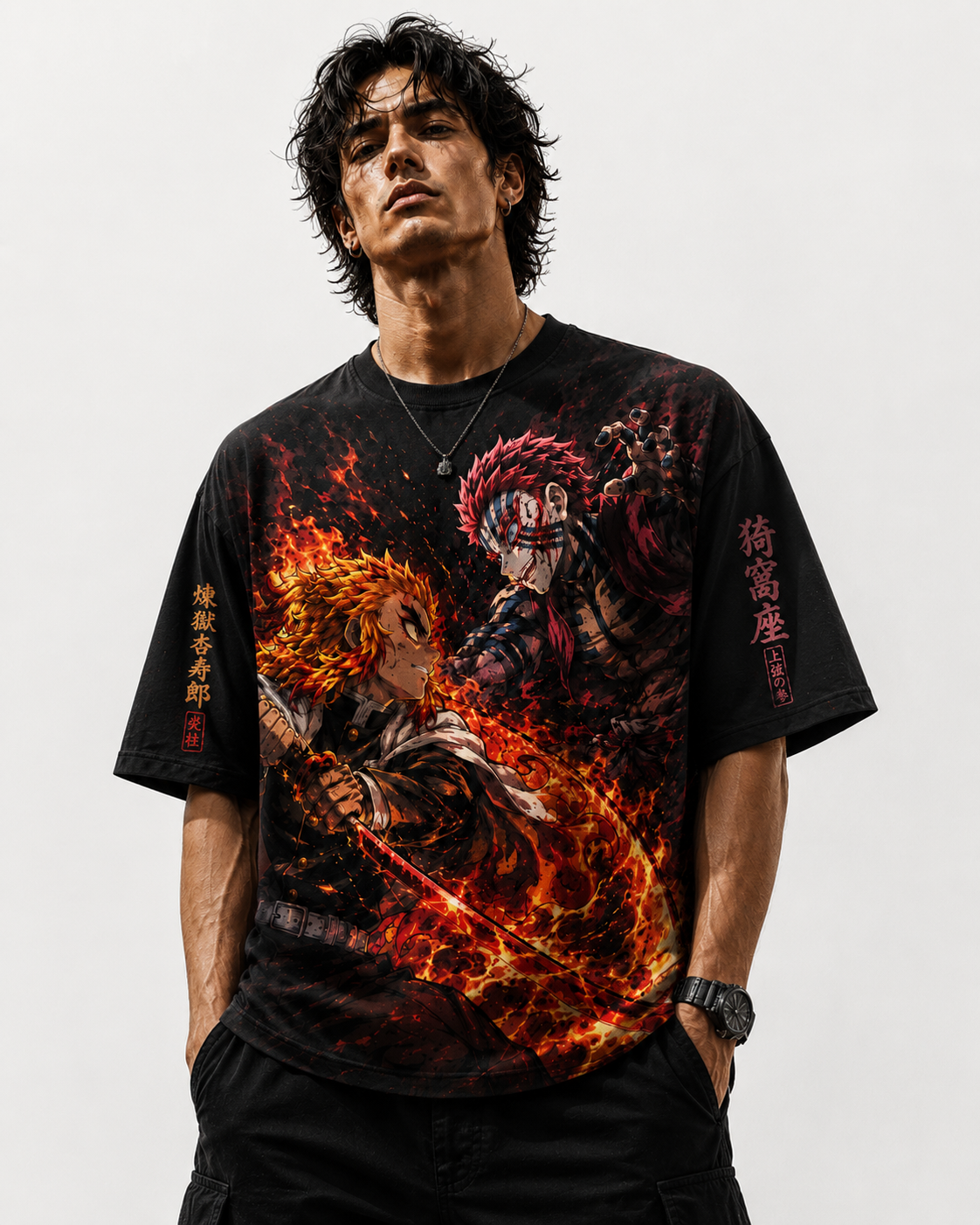 Male model wearing the black oversized Demon Slayer tshirt, showcasing the drop-shoulder fit and dynamic Rengoku front artwork.